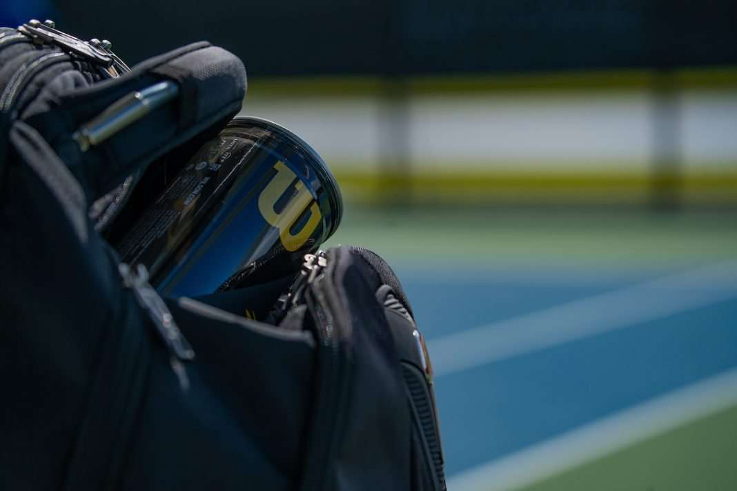 A Wilson ball can lies on an ITA official backpack at the 2021 ITA Cup in Rome, Georgia (Photo: Jacob Dye)